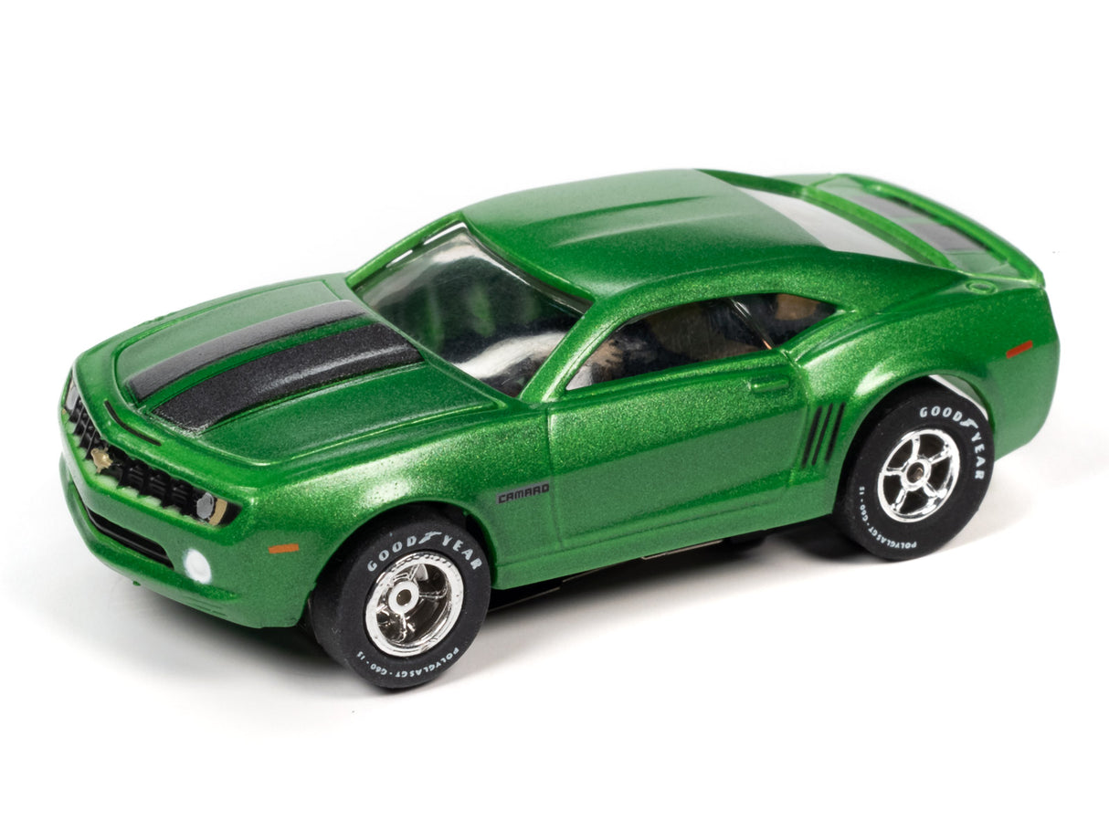 Green slot car of a muscle car with black racing stripes for Auto World SC354