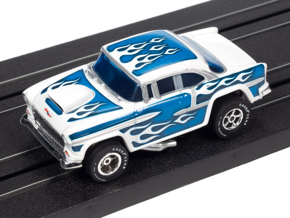 White and blue slot car muscle car toy on a black track for Auto World SC354