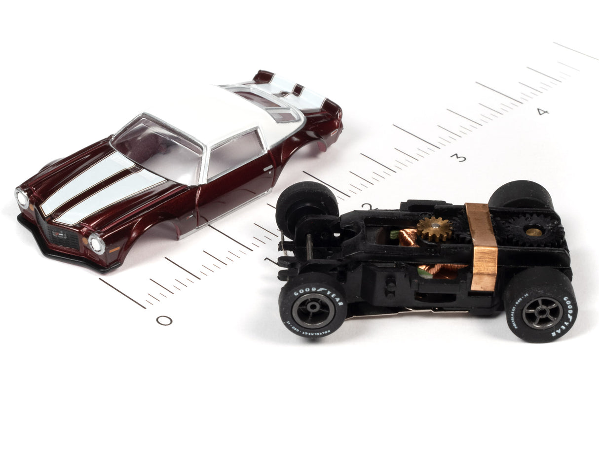 Slot car with open hood, showing engine details for Auto World SC354