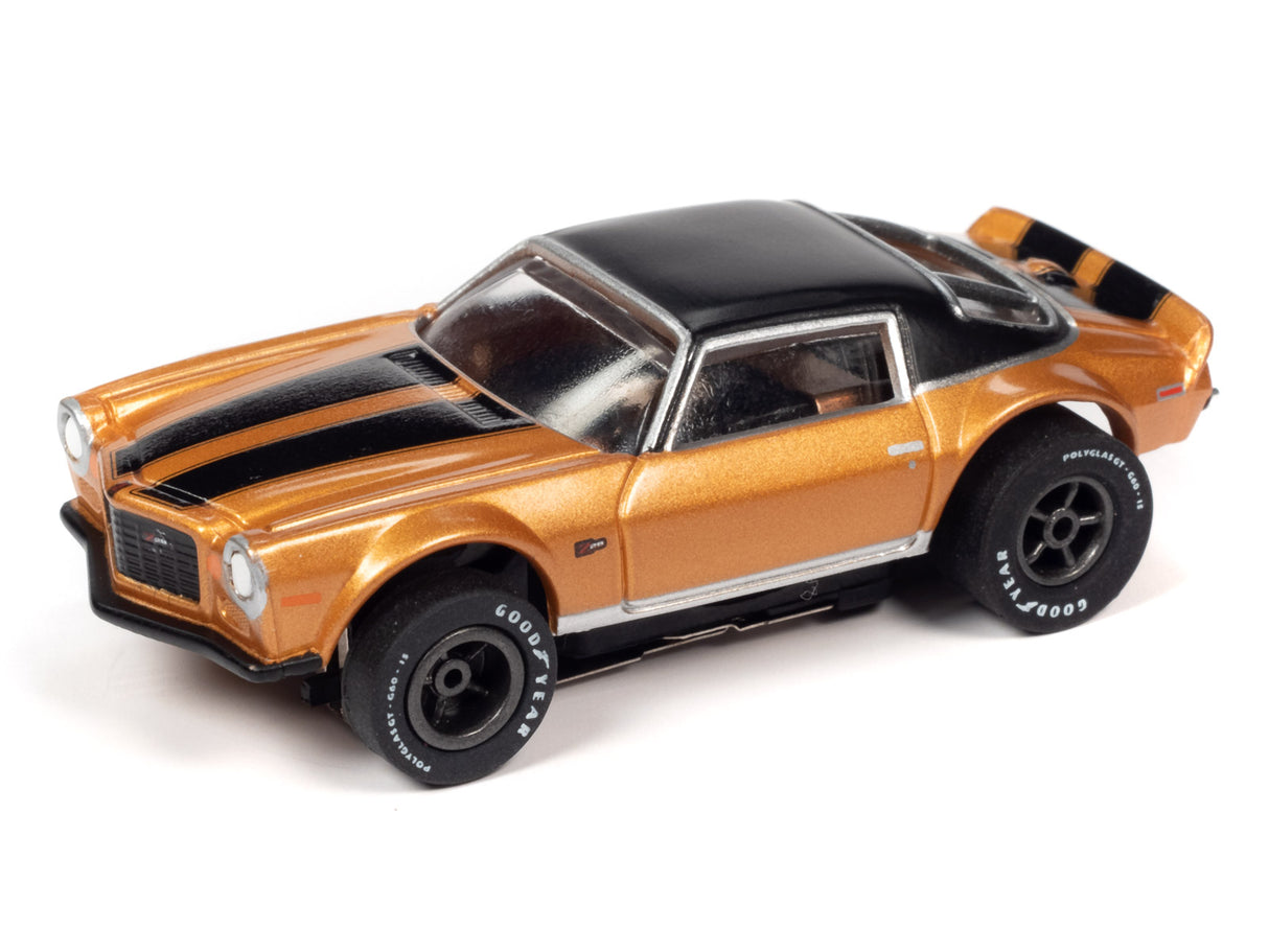 Gold and black slot car of a classic muscle car for Auto World SC354