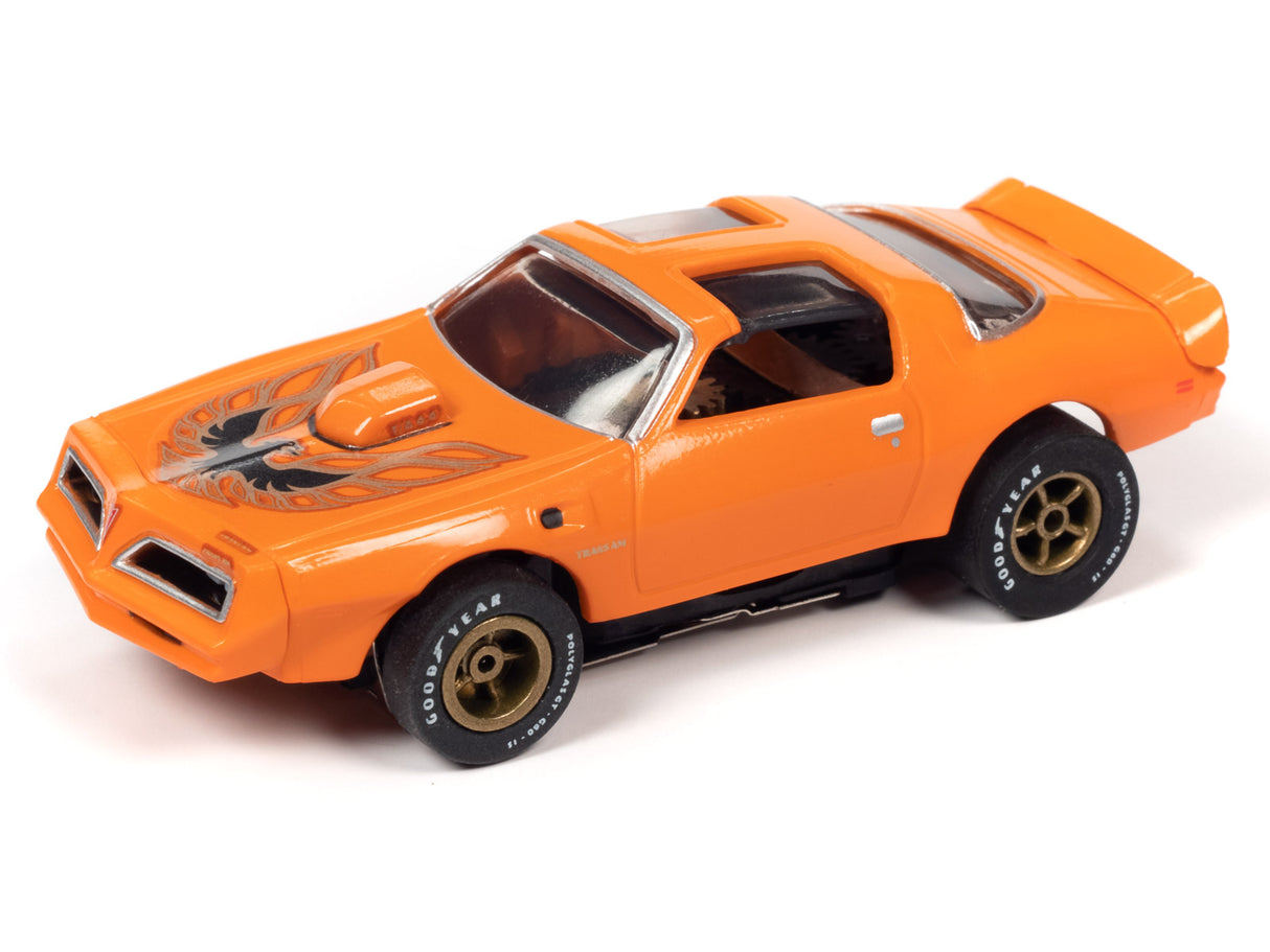 Orange slot car of a classic muscle car, viewed from the side for Auto World SC354