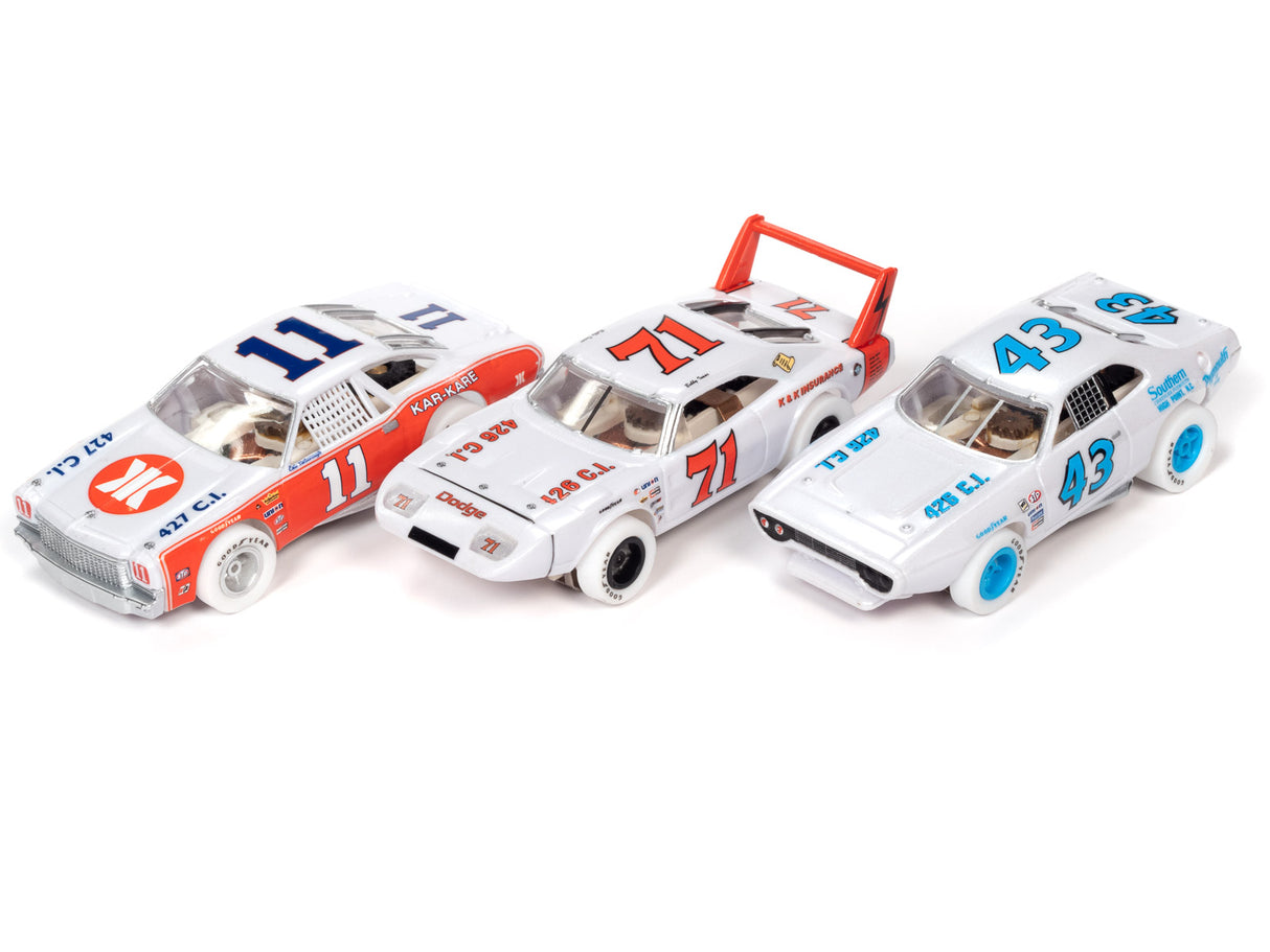 Three white stock car toy vehicles lined up on a white background for X-Traction SC355