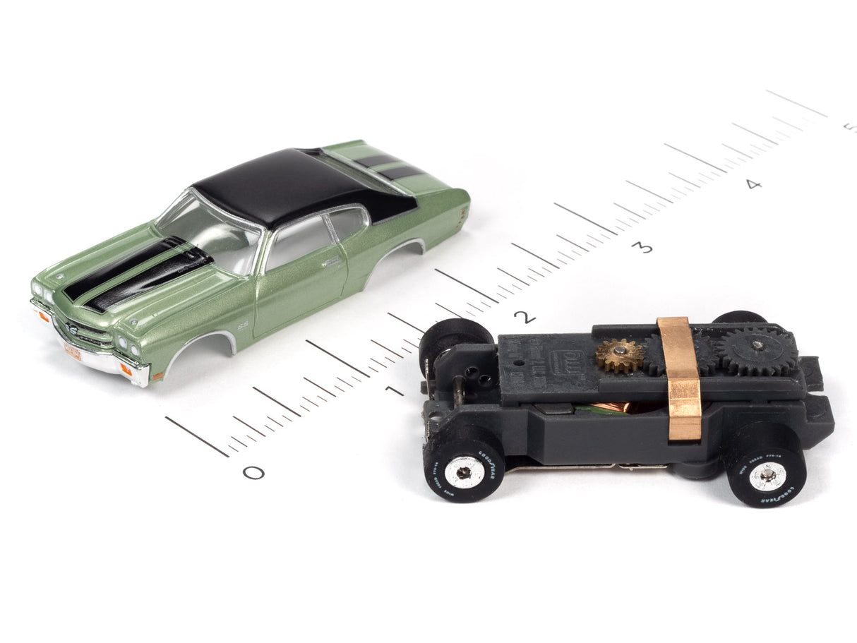 Green 1970 Chevelle and black toy car on a ruler for scale for SC359 Thunderjet-Release 32