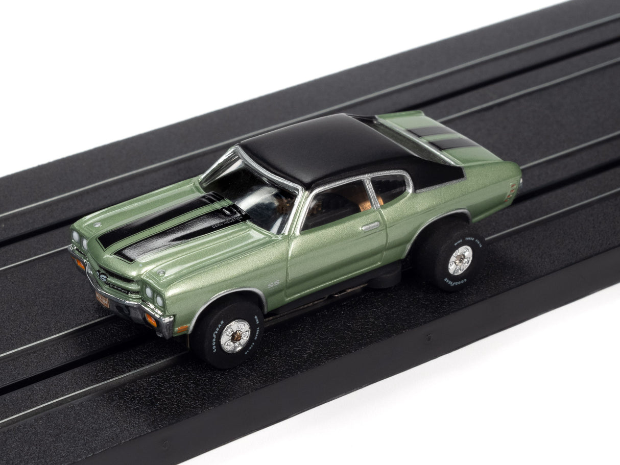 Green 1970 Chevelle SS slot car on a black track for SC359 Thunderjet-Release 32