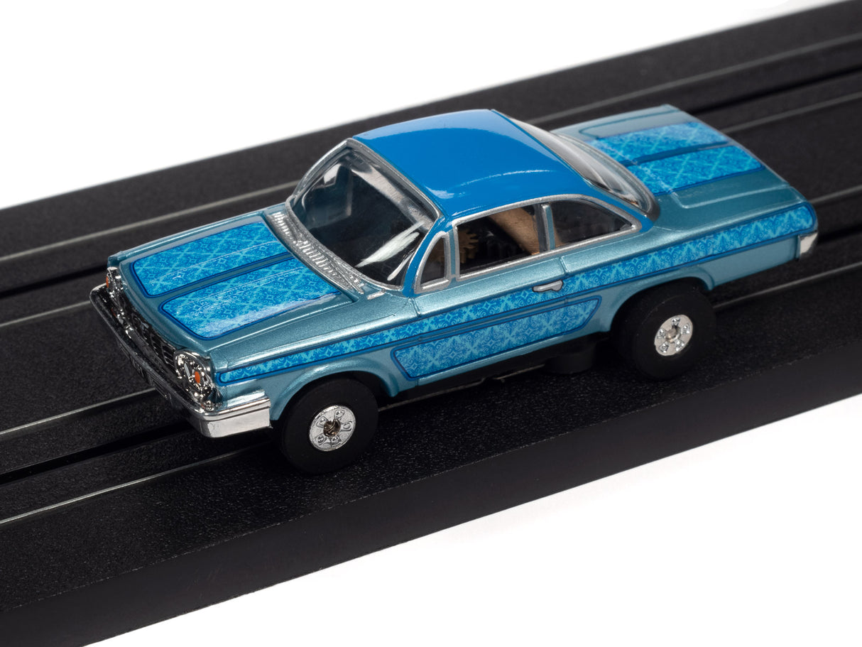 Blue classic car model on a black track for Auto World SC360