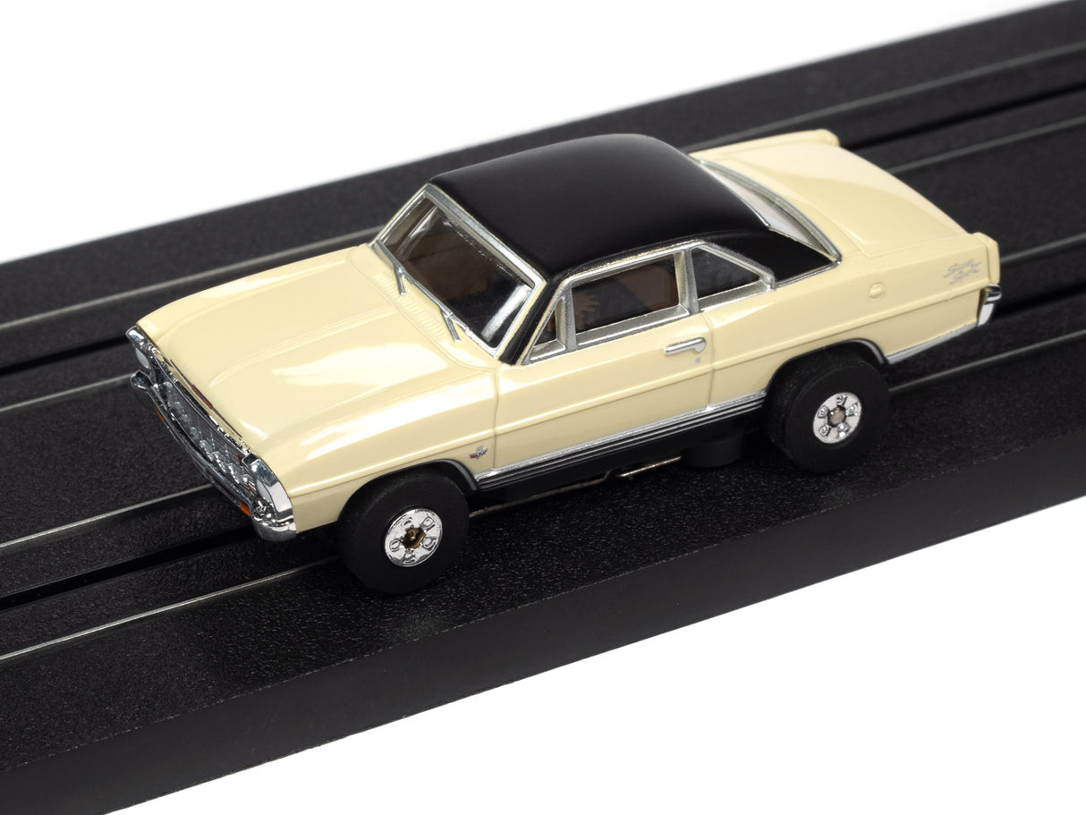 Yellow and black slot car on a black track for Auto World SC360