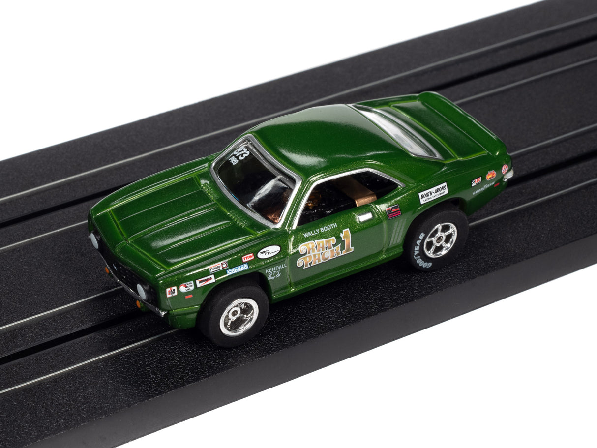 Green slot car on a black track for Auto World SC361