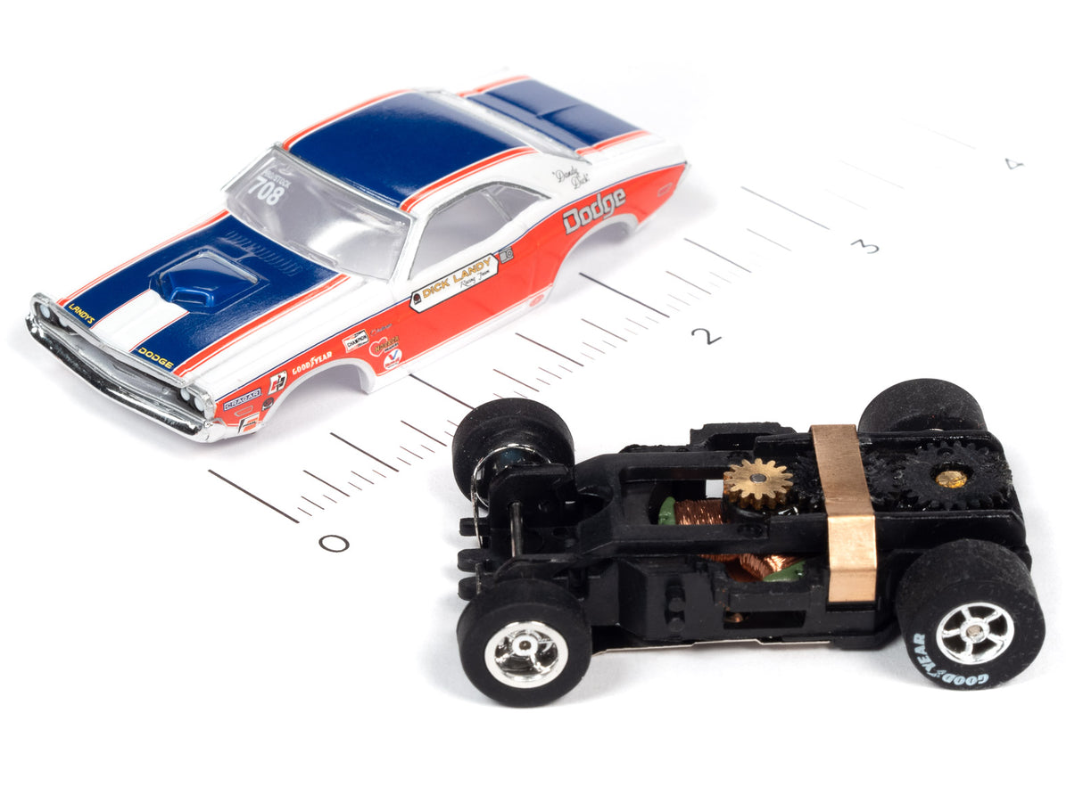 Slot car and engine assembly on a ruler for scale comparison for Auto World SC361
