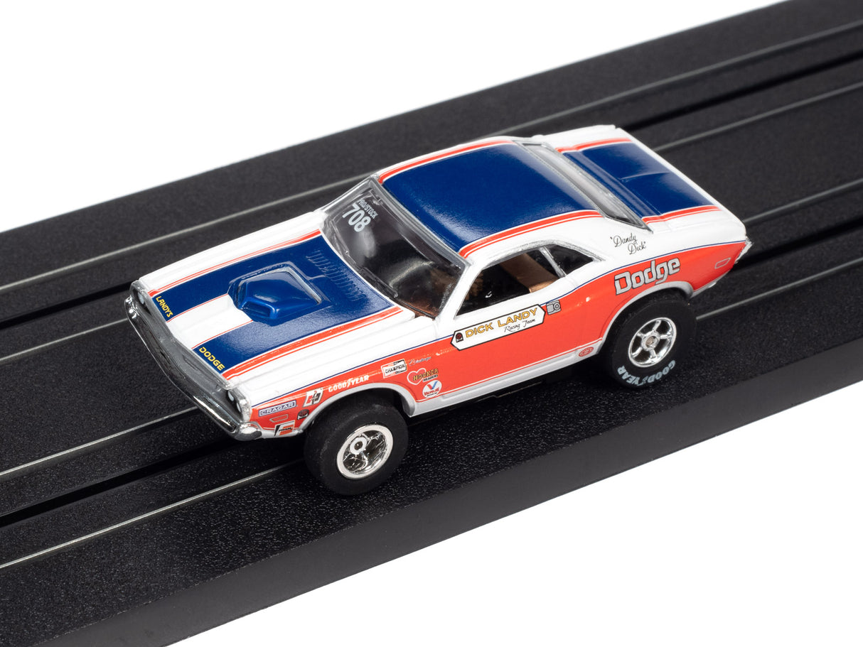 Red and white Dodge drag race car toy on a black track for Auto World SC361
