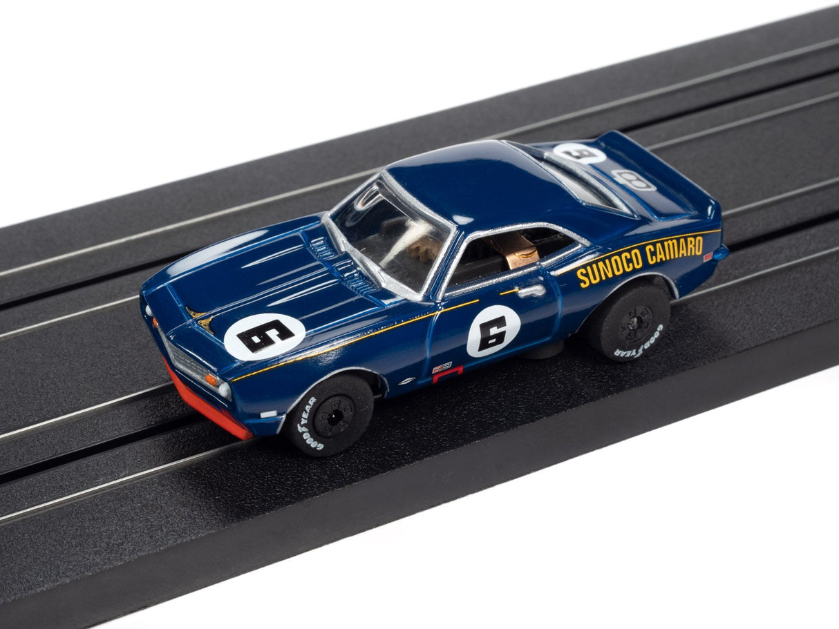 Blue slot car of a classic Camaro race car on a track for Auto World SC362