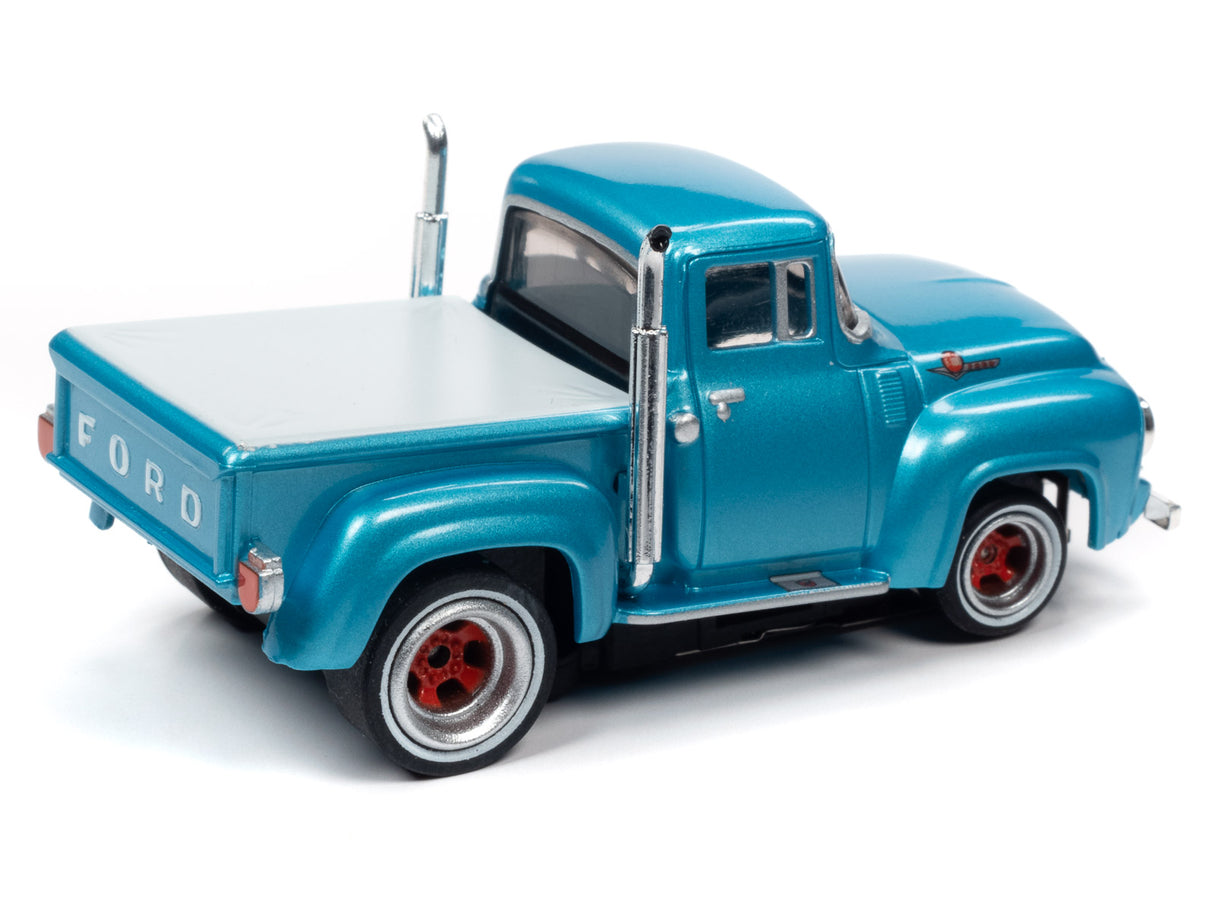 Blue scale model pickup truck with flatbed, ready for coastal cruising for Auto World SRS331