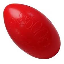 Red, oval-shaped toy putty with embossed lettering