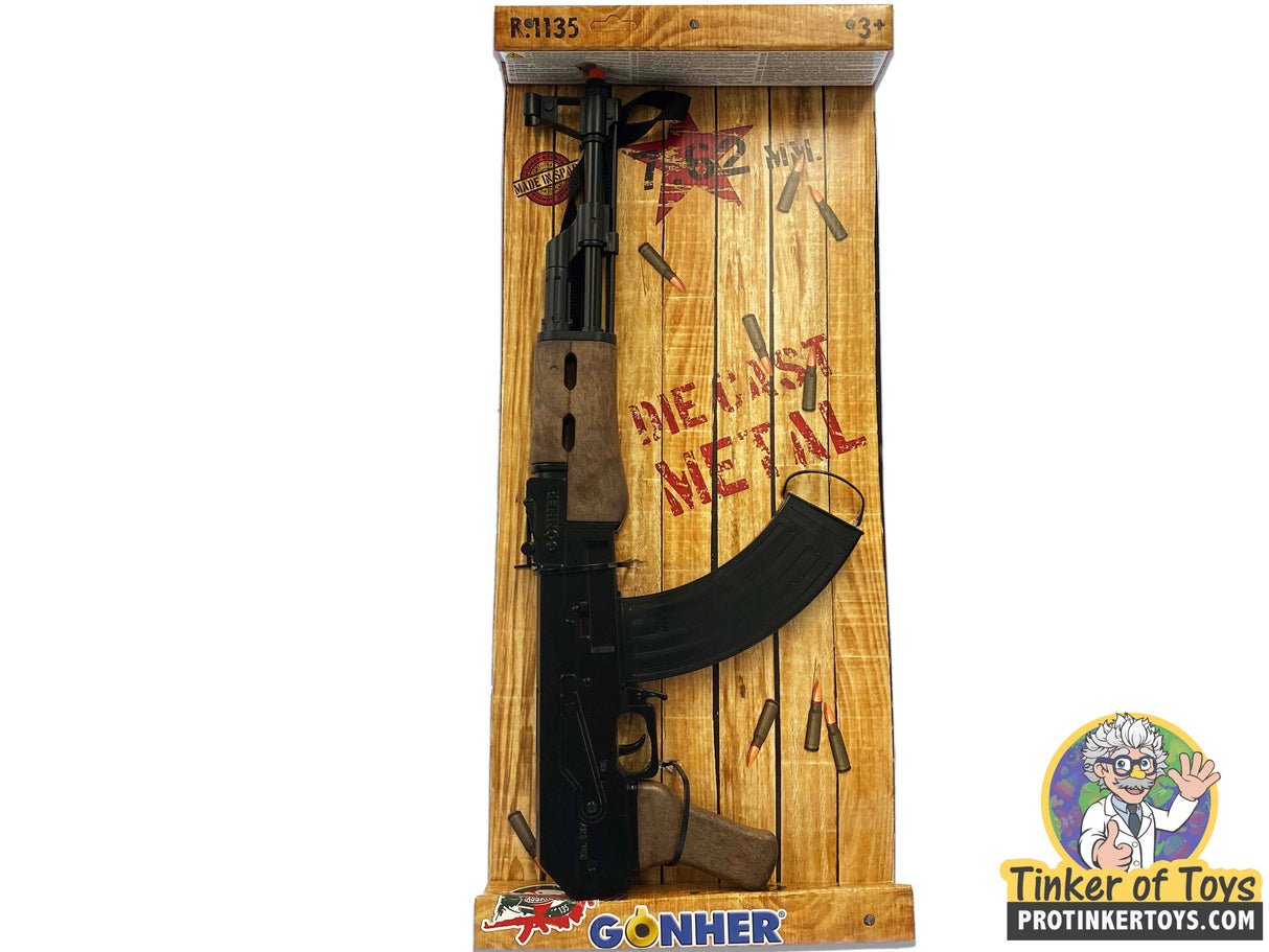 Assault rifle toy, R-1135, displayed on a wooden backdrop for Gonher 1135/6