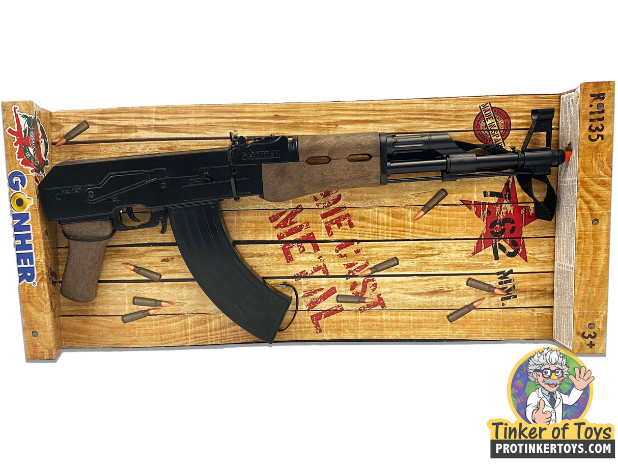 Toy AK-47 assault rifle displayed on a wooden crate backdrop for Gonher 1135/6
