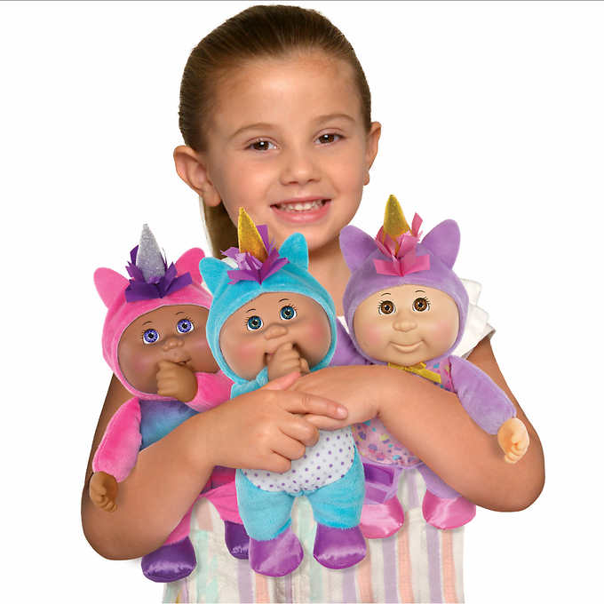 Girl with unicorn dolls: pink, blue, and purple fantasy friends for Cabbage Patch Kids 2238832