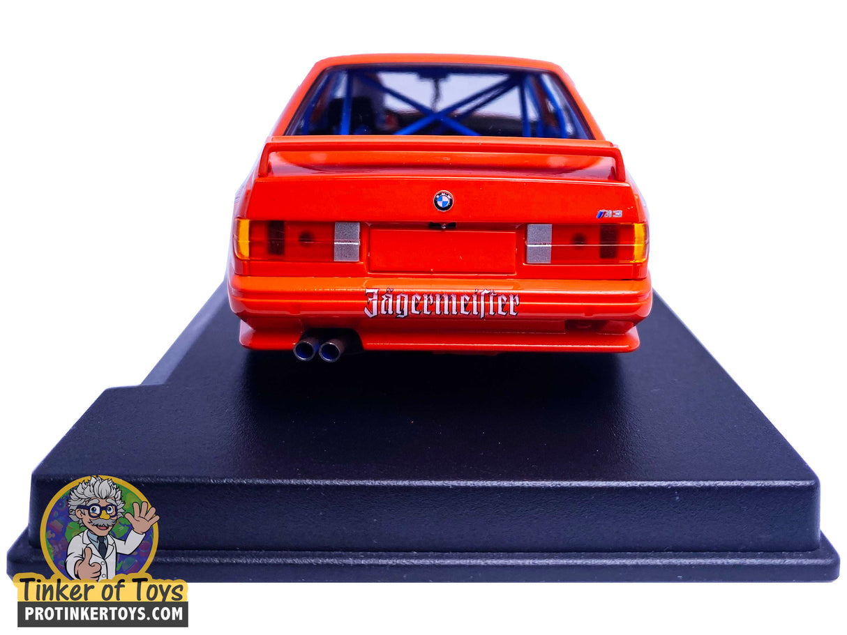 Orange BMW M3 E30 slot car, rear view, collectible model for Fly Car 88217