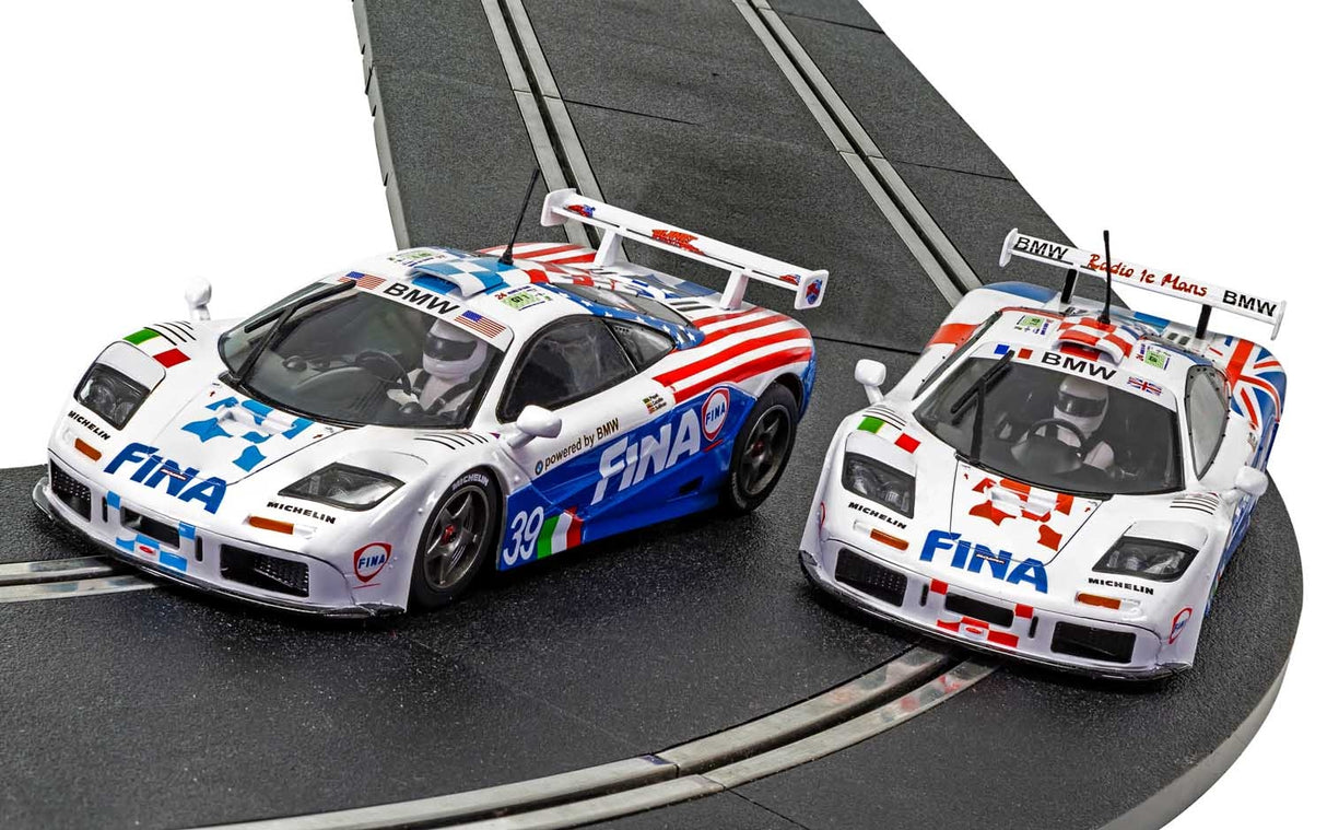 Two slot car race cars on a track: 1996 Le Mans models for Scalextric C4012A