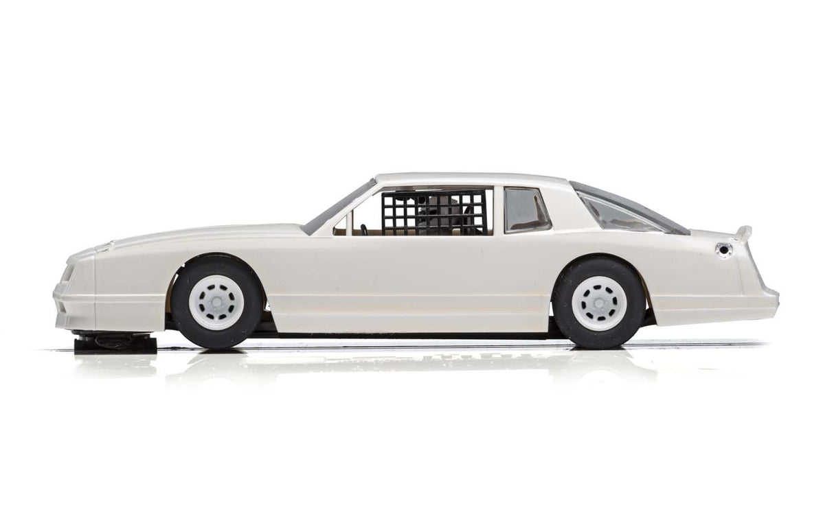White 1986 Chevrolet Monte Carlo model car viewed from the side for Scalextric C4072, rear view