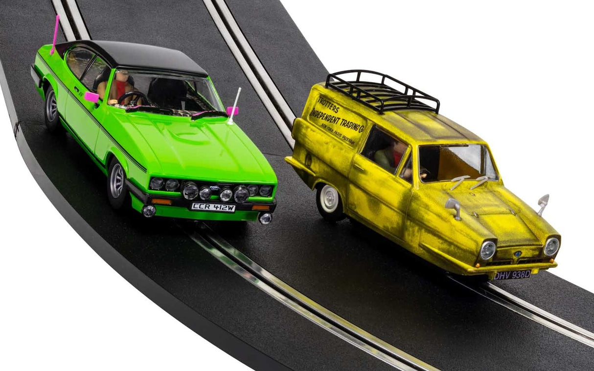Green and yellow replica cars on a track, representing a classic duo for 1/32 slot cars Scalextric C4179