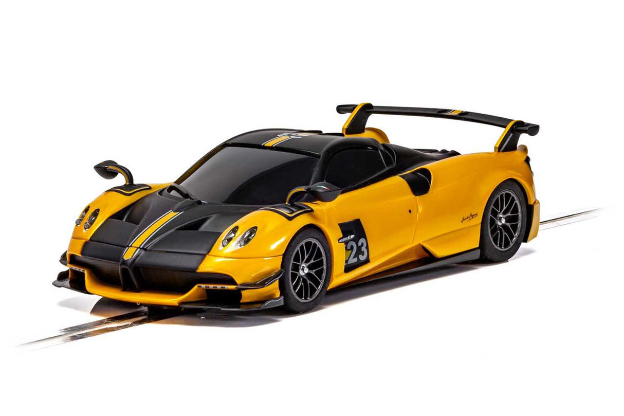 Yellow model car of a Pagani Huayra Roadster BC with black accents for Scalextric C4212