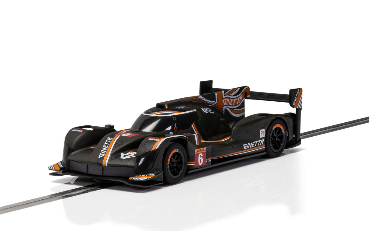 Black and orange Ginetta race car model on a track for Scalextric C4264
