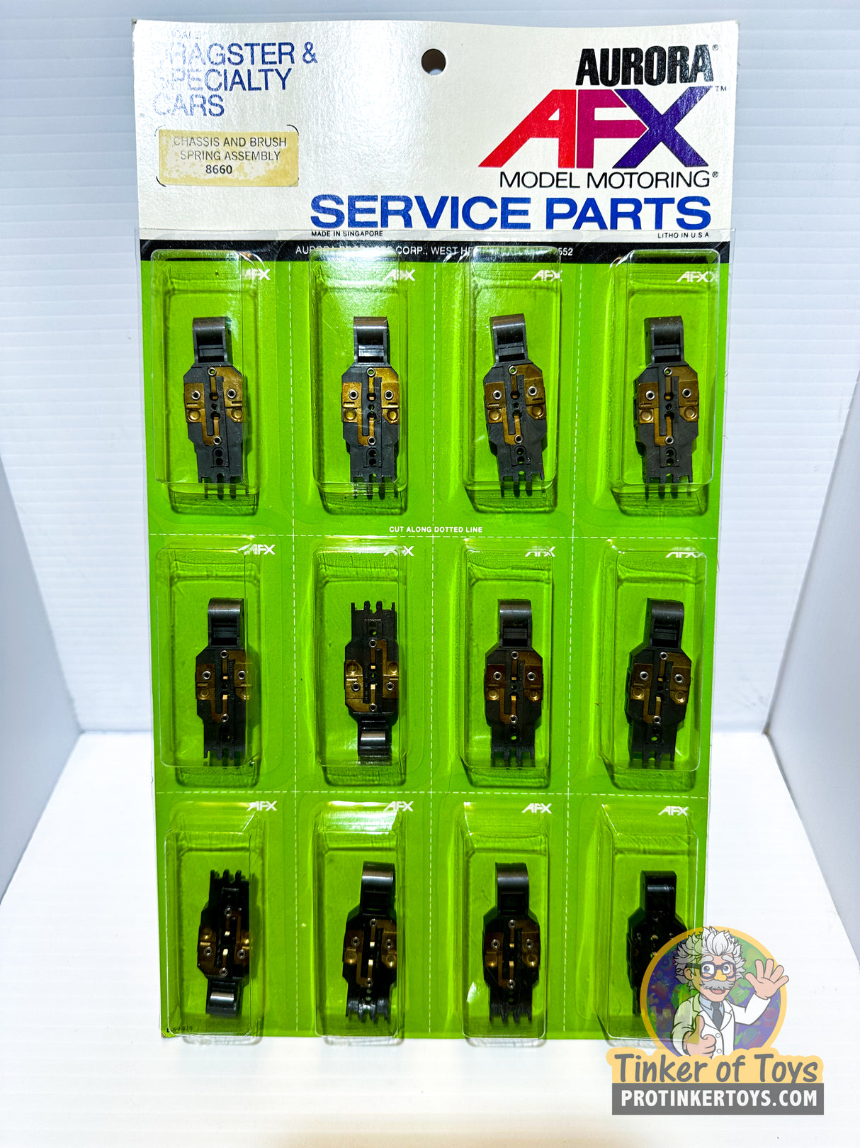 Chassis and Brush Spring Assembly | 8660 | Aurora /AFX Racing