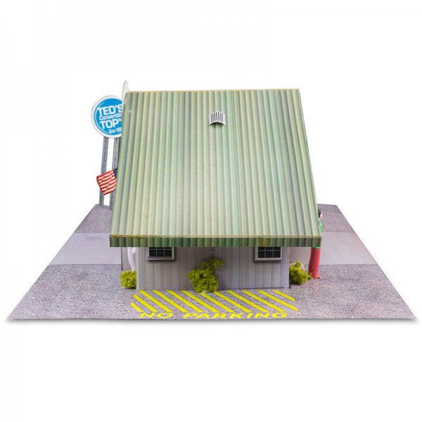 Model kit of a commercial steel garage with a light green sloped roof for Innovative Hobby Supply BK4810