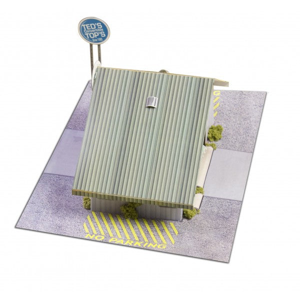 Model kit of a commercial steel garage with a "Ted's Top's" sign for Innovative Hobby Supply BK4810