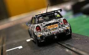 Miniature race car on track, detailed model of a BMW Mini Cooper for Scalextric C3873