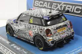 Miniature race car model, BMW Mini Cooper, with racing decals for Scalextric C3873