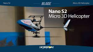 Small, blue and white micro helicopter model on a stand for Blade BLHO1350