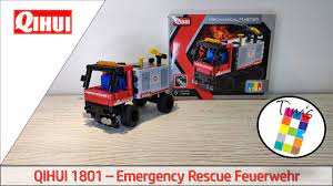 Red and black toy fire truck building set with box art for Qihui QIH01801