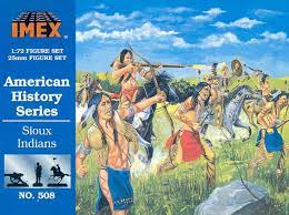 Sioux Indians reenacting a historical scene in a grassy field under a blue sky for IMEX 508
