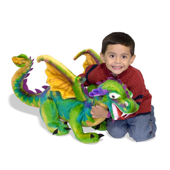 Boy with colorful dragon plush toy for Melissa and Doug 2121