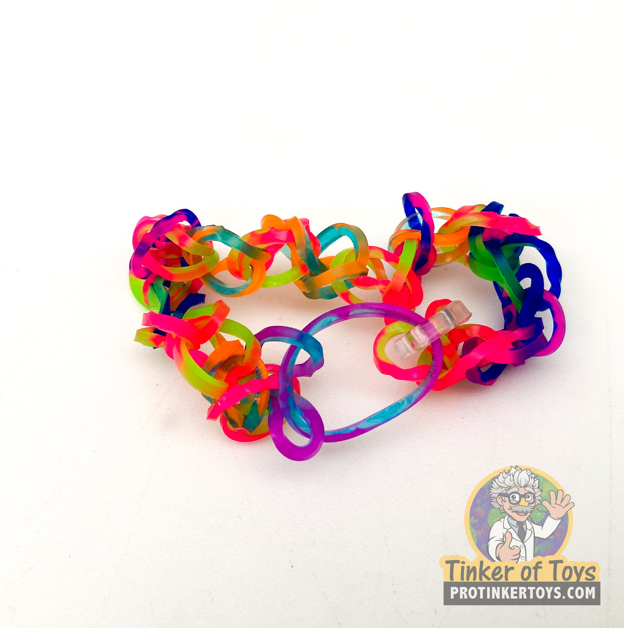 Assorted colorful rainbow loom bracelets on white background