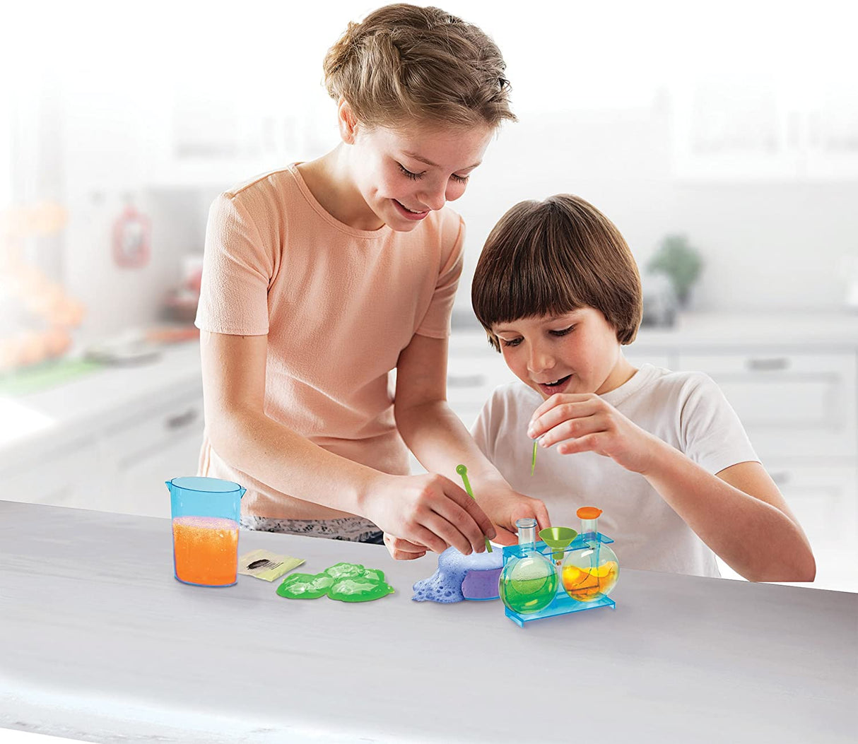 Two children experiment with colorful liquids and materials at a lab table for Smart Lab 00062
