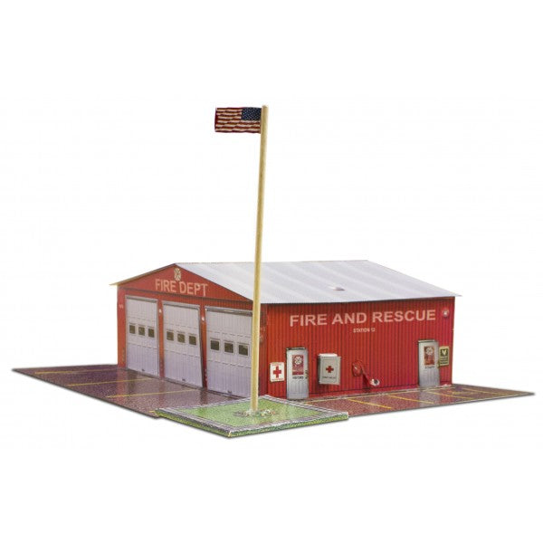 Model kit of a fire department building with an American flag flying for Innovative Hobby Supply BK6414