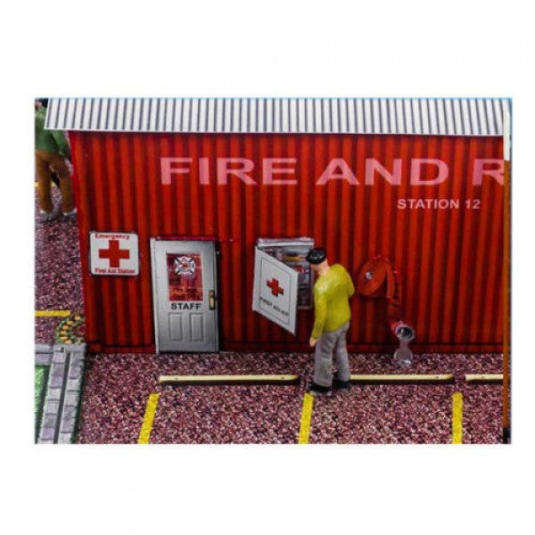 Model kit of a fire station with firefighter figure and equipment for Innovative Hobby Supply BK6414