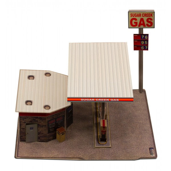 Model kit of a gas station with pumps and signage for Innovative Hobby Supply BK3208