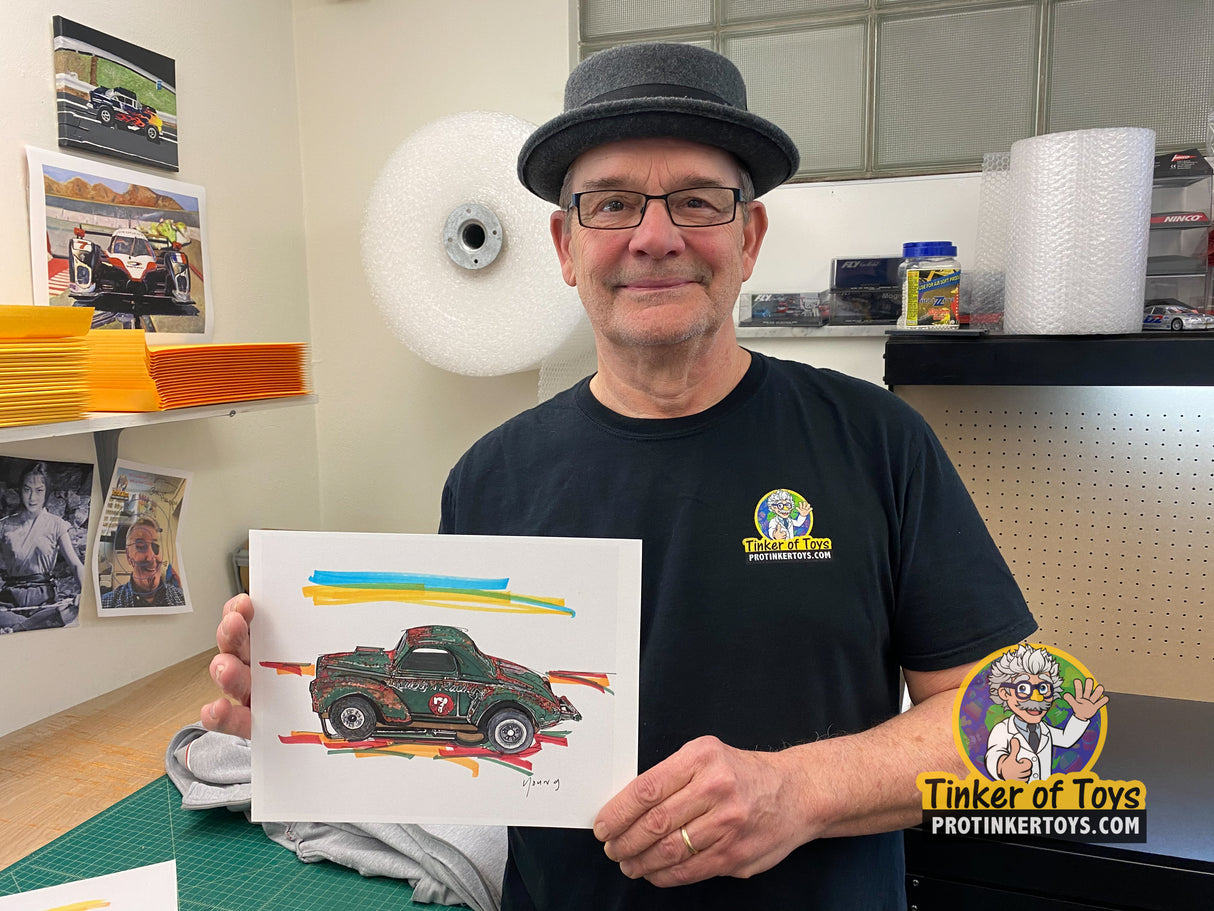 Man holds artwork: 1941 Willys Gasser SC345 drawing for Timothy W. Young 8”x10”