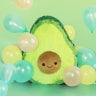 Cute, squishy avocado toy surrounded by small, colorful balls for Squishable 104349