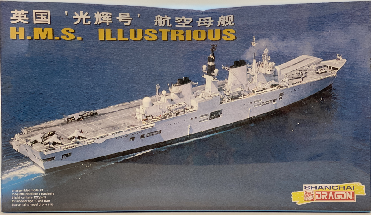 Model kit box art showing the H.M.S. Illustrious aircraft carrier at sea for Dragon 7033