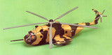 Model helicopter kit, Jolly Green Giant style, on a green surface for Atlantis Model Co ALM505