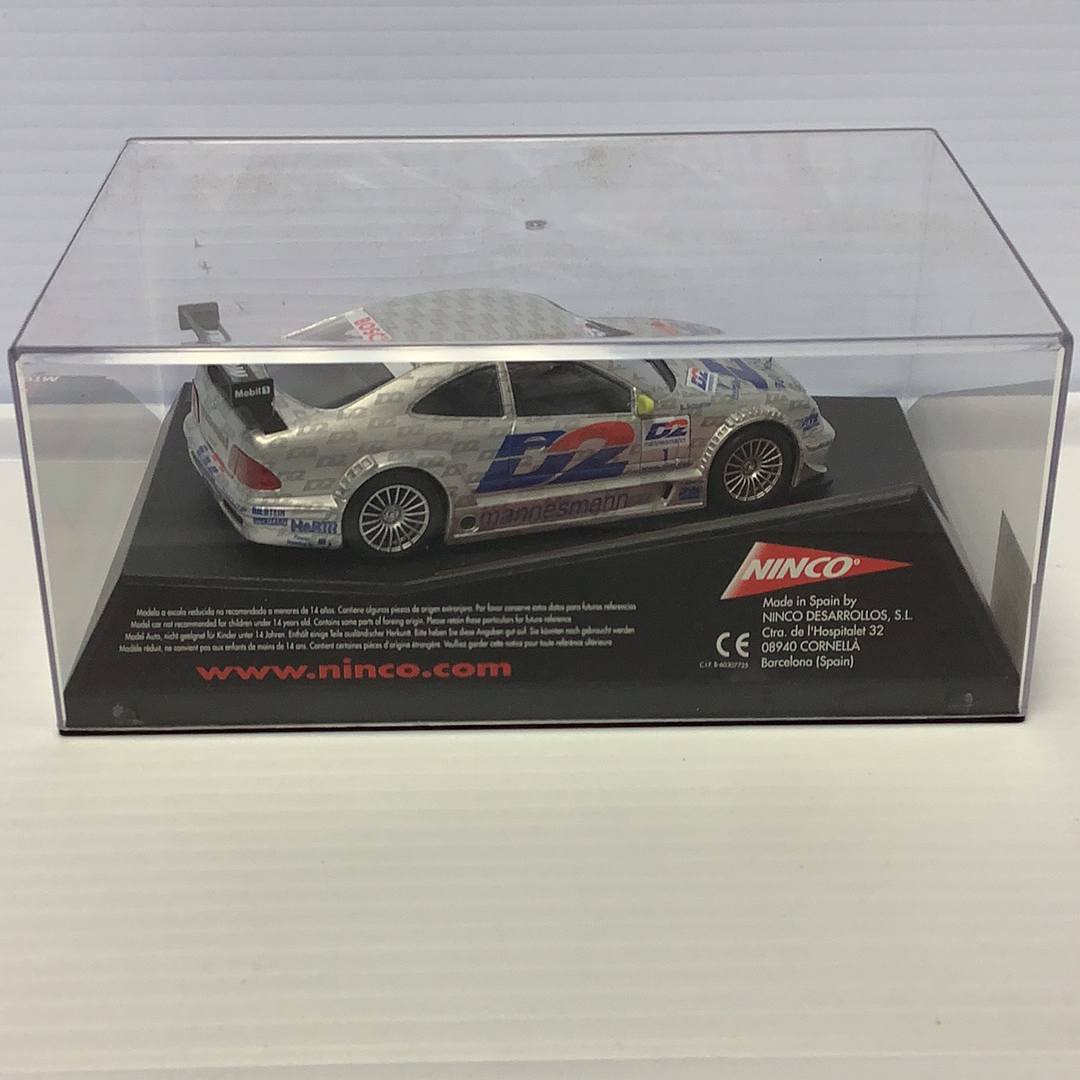 Slot car of a Mercedes CLK DTM race car in a clear display box for Ninco 50229