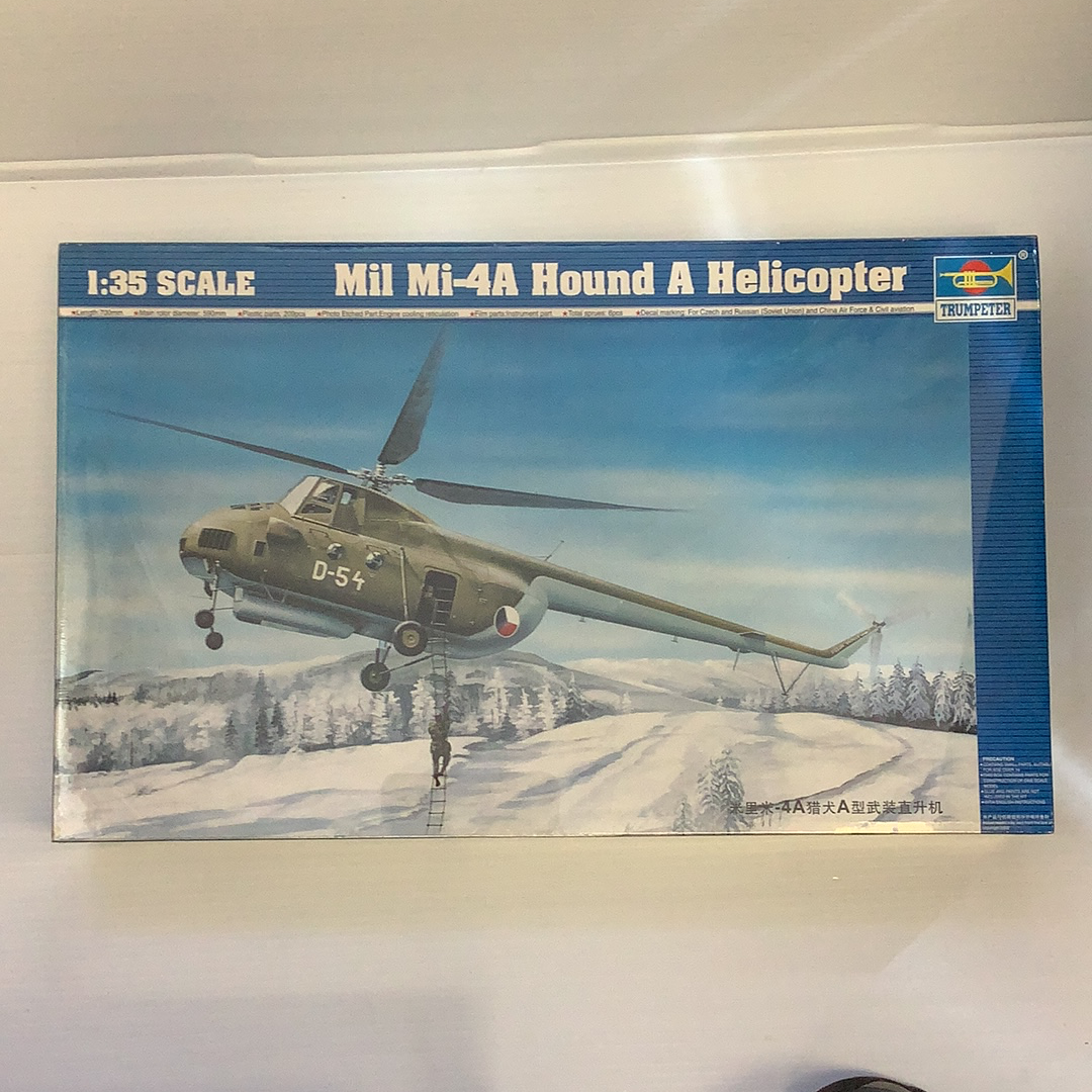 1:35 scale model kit box art showing a Mil Mi-4A Hound A helicopter in a snowy landscape for Trumpeter TRP5101