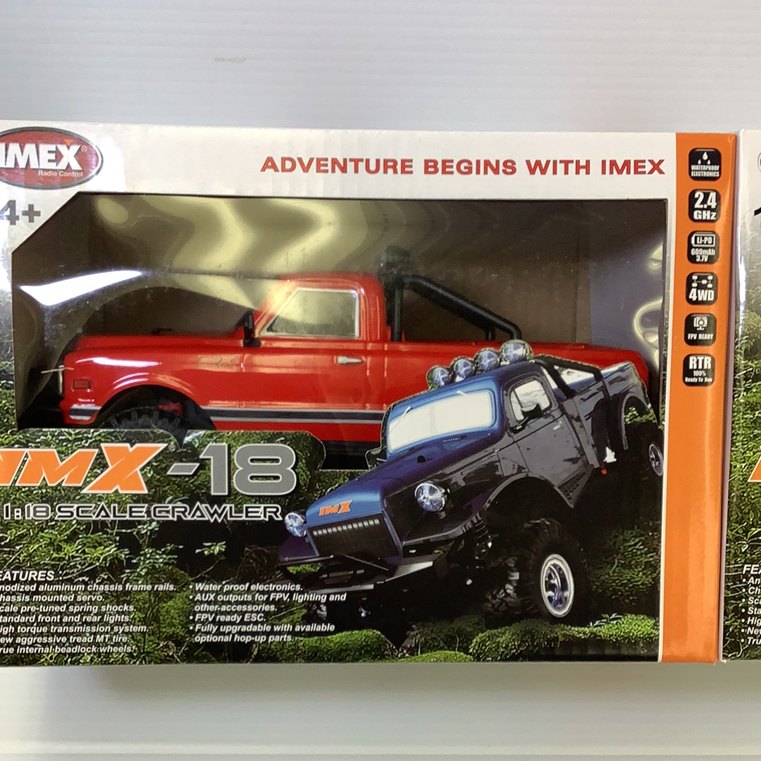 Red and blue scale crawler toy on grass, ready for action for IMX IMX25000