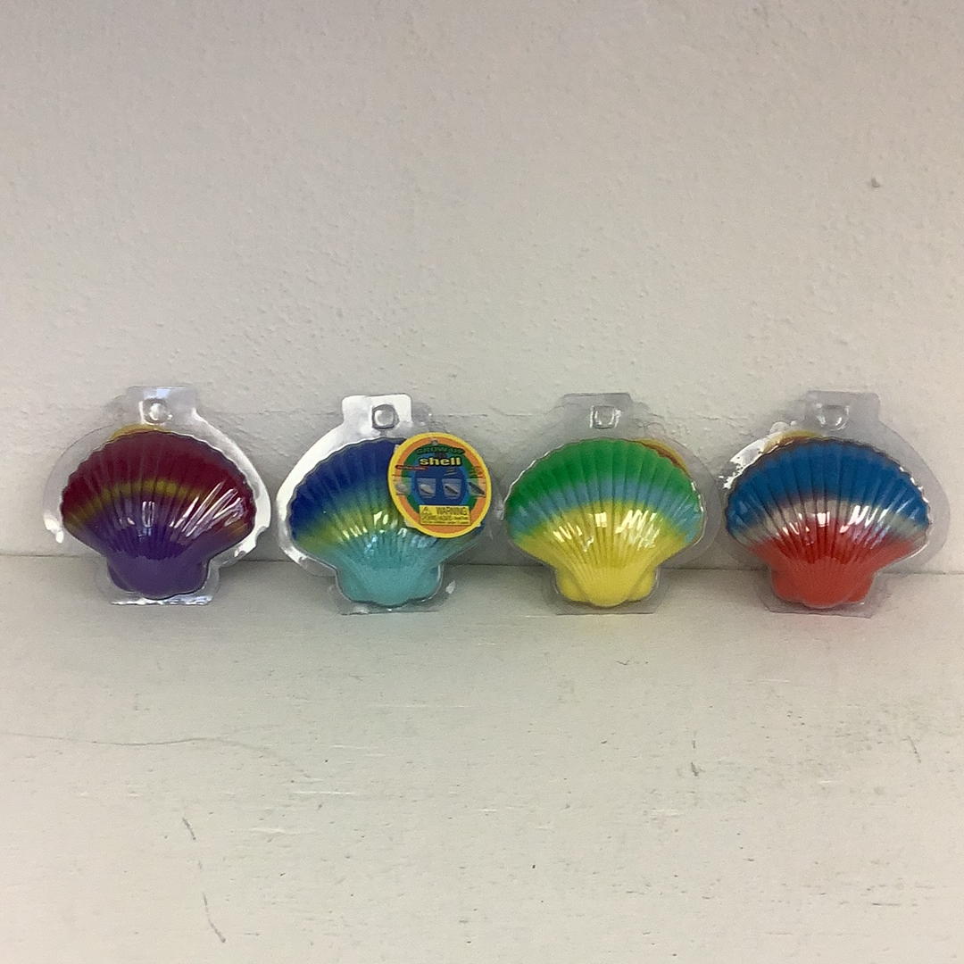 Four colorful, sealed magic shells containing a mermaid toy for Schylling 87363TY