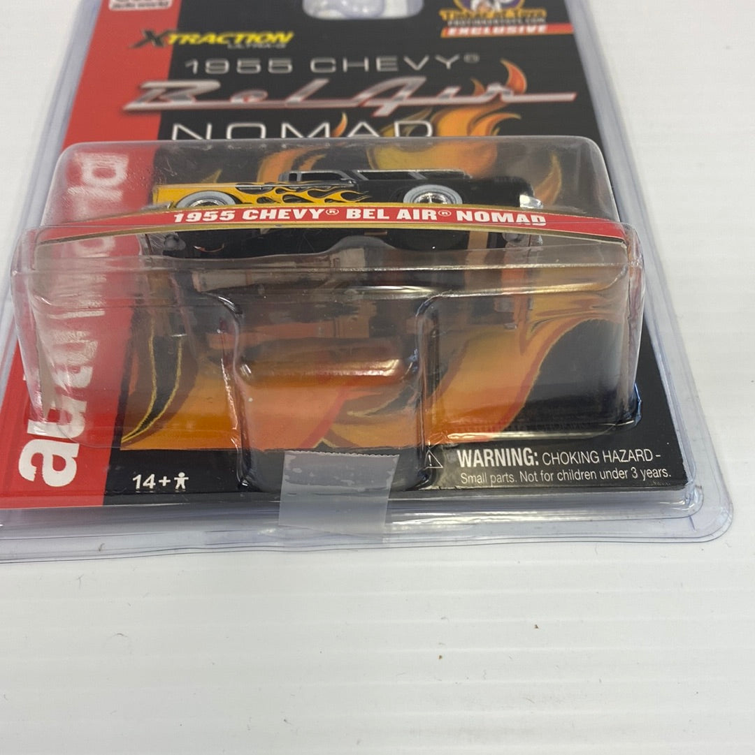 Black 1955 Chevrolet Nomad slot car in clear plastic packaging for Auto World CP7781