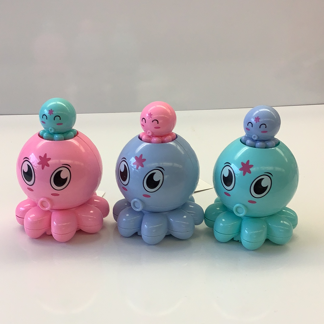 Three colorful, push-and-go octopus toys in pink, blue, and teal for Schylling 88509TY, front view
