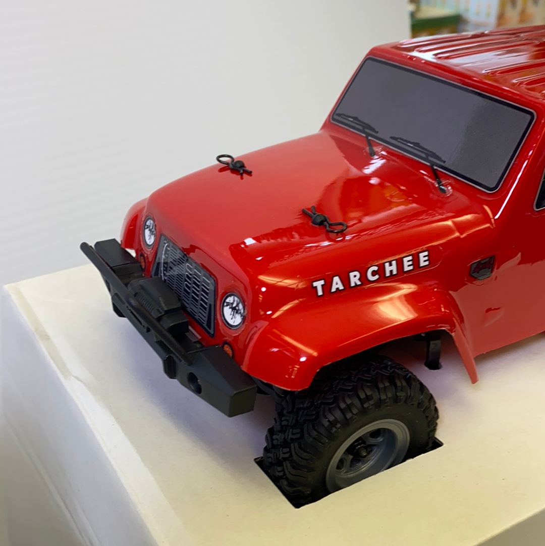 Red scale crawler vehicle with off-road tires and front bumper for IMX IMX25055